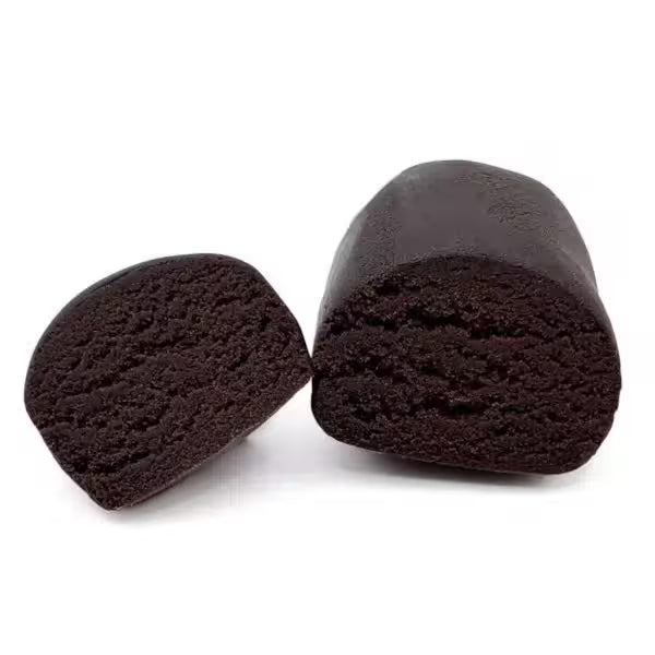 Lebanese red cbd hash cut in half with white background