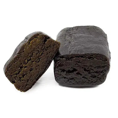 black ice-o-lator hash cut in half on a complete white background